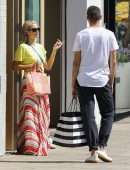 Paris Hilton "Pokies" in Yellow tshirt Out in Malibu