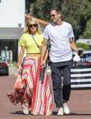 Paris Hilton "Pokies" in Yellow tshirt Out in Malibu