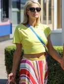 Paris Hilton "Pokies" in Yellow tshirt Out in Malibu