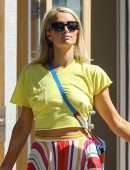 Paris Hilton "Pokies" in Yellow tshirt Out in Malibu