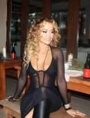 Rita Ora Looks Stunning in a See-Through Black Dress