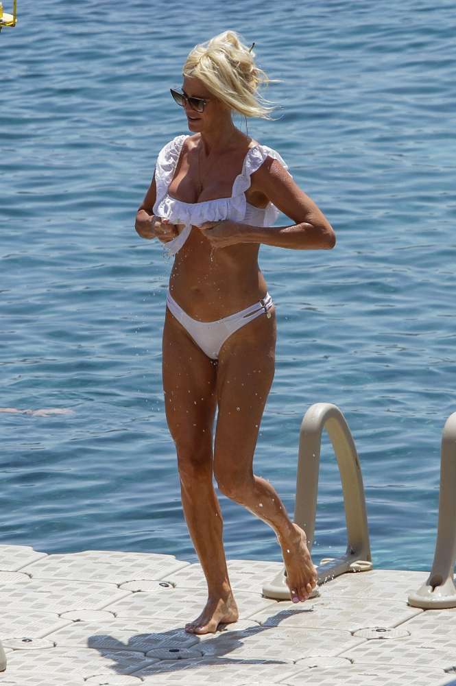 Victoria Silvstedt in White Bikini on a Beach in Mykonos