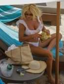 Victoria Silvstedt in White Bikini on a Beach in Mykonos