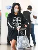 Vanessa Hudgens Leggy, Arrives at JFK Airport in New York