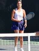 April Love Geary Playing a Tennis Game with Friends in Calabasas