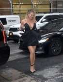 Chrissy Teigen Leggy in a Short Black Dress, Smiling' Out in New York