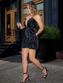 Chrissy Teigen Leggy in a Short Black Dress, Smiling' Out in New York