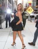 Chrissy Teigen Leggy in a Short Black Dress, Smiling' Out in New York