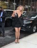 Chrissy Teigen Leggy in a Short Black Dress, Smiling' Out in New York