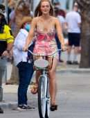 Elle Fanning Upskirt while Riding a Bicycle at Hulu’s TV Series Set in Tybee Island