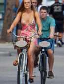Elle Fanning Upskirt while Riding a Bicycle at Hulu’s TV Series Set in Tybee Island