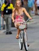 Elle Fanning Upskirt while Riding a Bicycle at Hulu’s TV Series Set in Tybee Island