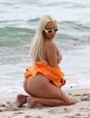 Tana Mongeau Booty in a Bikini with Friends on Beach in Miami