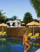 Kimberley Garner Booty in Yellow Swimsuit at a Pool