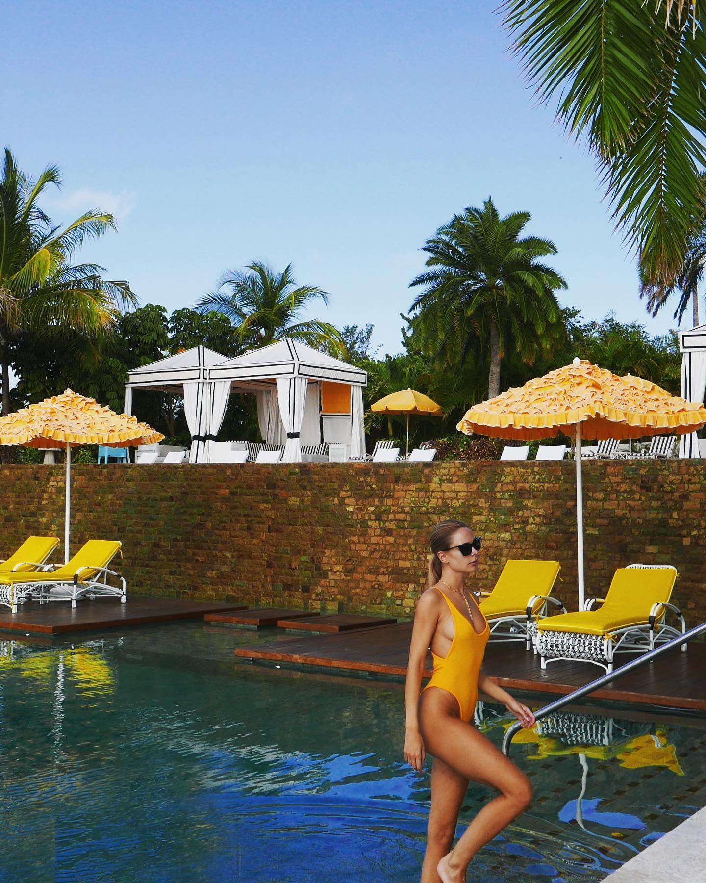 Kimberley Garner Booty in Yellow Swimsuit at a Pool
