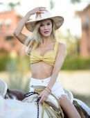 Joy Corrigan Cleavage and Leggy, in Bikini Top and White Shorts in Cabo San Lucas
