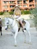 Joy Corrigan Cleavage and Leggy, in Bikini Top and White Shorts in Cabo San Lucas