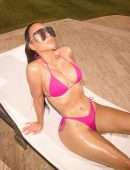 Kim Kardashian Wet Booty in a Tiny Pink Bikini