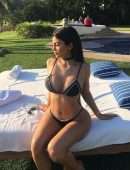 Kylie Jenner Big Booty and Cleavage in a Thong Black Bikini