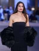 Laetitia Casta at Defile de Mode Pret-a-porter at Fashion Week in Paris