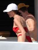 Olivia Culpo Cleavage and Booty in Red Thong Bikini On a Yacht in Cabo San Lucas