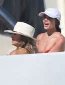 Olivia Culpo Cleavage and Booty in Red Thong Bikini On a Yacht in Cabo San Lucas