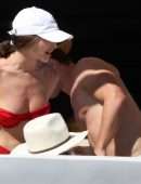 Olivia Culpo Cleavage and Booty in Red Thong Bikini On a Yacht in Cabo San Lucas