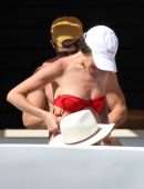 Olivia Culpo Cleavage and Booty in Red Thong Bikini On a Yacht in Cabo San Lucas