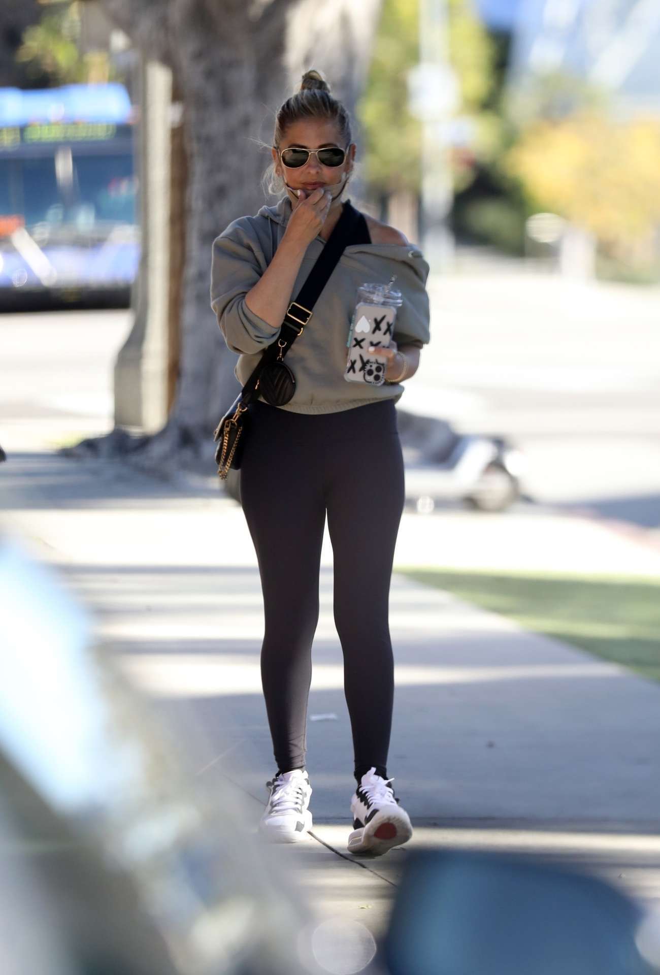 Sarah Michelle Gellar Holding Ice Coffee after her Morning Workout in Brentwood