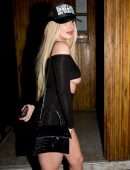 Tana Mongeau Underboobs in Black Dress at the Nice Guy in West Hollywood