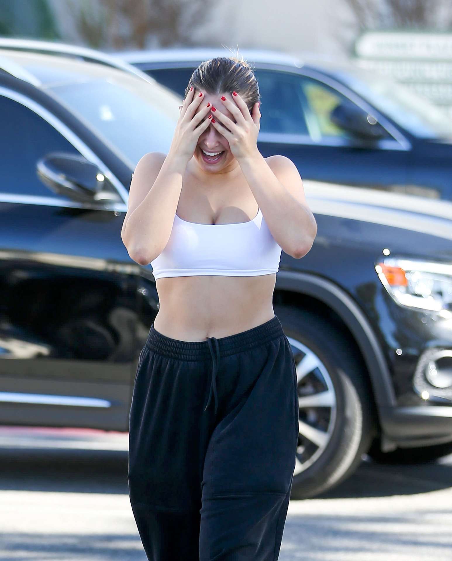 Addison Rae Cleavage in a White Sports Bra Out in West Hollywood