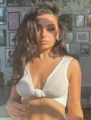 Charli XCX Pokies in a Sheer Wet Top