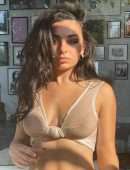 Charli XCX Pokies in a Sheer Wet Top