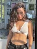 Charli XCX Pokies in a Sheer Wet Top
