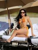 Dua Lipa Leggy and Cleavage in Bikini at the Beach in Miami