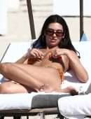 Dua Lipa Leggy and Cleavage in Bikini at the Beach in Miami