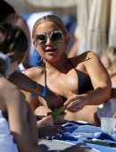 Kate Hudson Cleavage in Bikini Top on a Beach in Miami