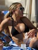Kate Hudson Cleavage in Bikini Top on a Beach in Miami