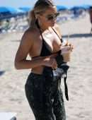 Kate Hudson Cleavage in Bikini Top on a Beach in Miami