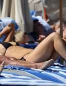 Kate Hudson Cleavage in Bikini Top on a Beach in Miami