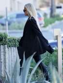 Khloe Kardashian in Tight Black Bodysuit at a Skims Shoot for Sister Kim in Burbank