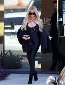 Khloe Kardashian in Tight Black Bodysuit at a Skims Shoot for Sister Kim in Burbank