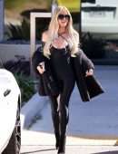 Khloe Kardashian in Tight Black Bodysuit at a Skims Shoot for Sister Kim in Burbank