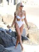 Lindsey Pelas Booty and a Cleavage in a Skimpy Bikini on a Beach in Malibu