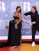 Maya Jama Cleavage and Belly Button in Revealing Dress at The BRIT Awards 2022 in London