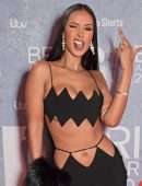 Maya Jama Cleavage and Belly Button in Revealing Dress at The BRIT Awards 2022 in London