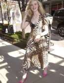 Elle Fanning in Animal Print Dress Going to Live with Kelly & Ryan in NYC