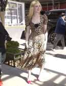 Elle Fanning in Animal Print Dress Going to Live with Kelly & Ryan in NYC