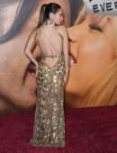 Lily James Cleavage in a Golden Dress at “Pam & Tommy” Finale Premiere in Los Angeles
