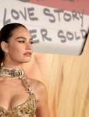 Lily James Cleavage in a Golden Dress at “Pam & Tommy” Finale Premiere in Los Angeles